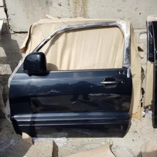  Дверь передняя левая черная Mitsubishi Pajero 3 Арт 63144, вид 1