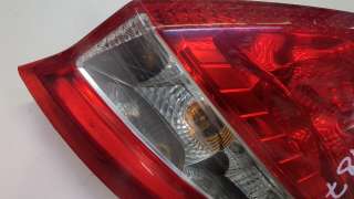 Фонарь задний правый Ford Fiesta 6 2011г.  - Фото 5
