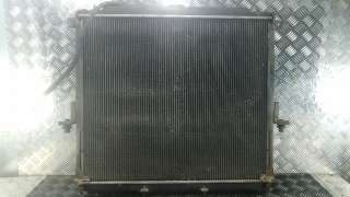 Радиатор системы охлаждения Nissan Navara D40 2009г.  - Фото 6