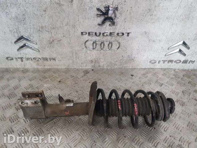 Стойка амортизатора переднего правого Peugeot 5008 2013г.  - Фото 1