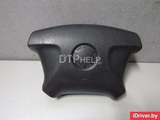 Подушка безопасности в рулевое колесо Mazda Demio 1 1997г.  - Фото 1