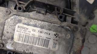 Вентилятор радиатора BMW 1 E81/E82/E87/E88 2009г.  - Фото 3