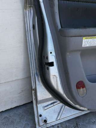 Дверь передняя левая Kia Sorento 1 2004г.  - Фото 9