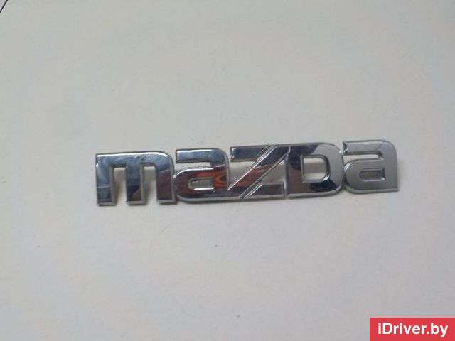 Эмблема на крышку багажника Mazda CX-7 2009г. EG2151710 Mazda - Фото 1