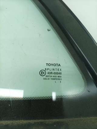 Стекло кузовное боковое левое Toyota Avensis 1 2000г.  - Фото 3